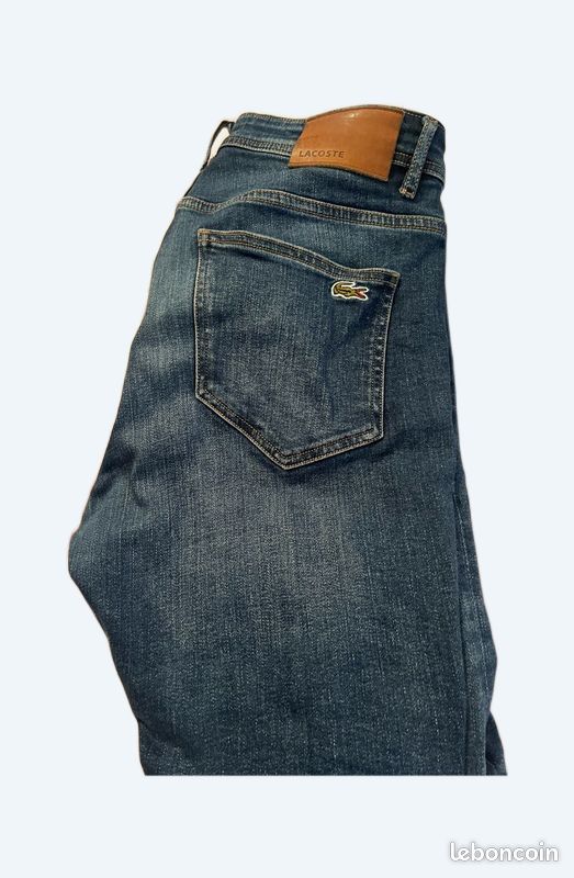 Jeans homme Lacoste Vêtements