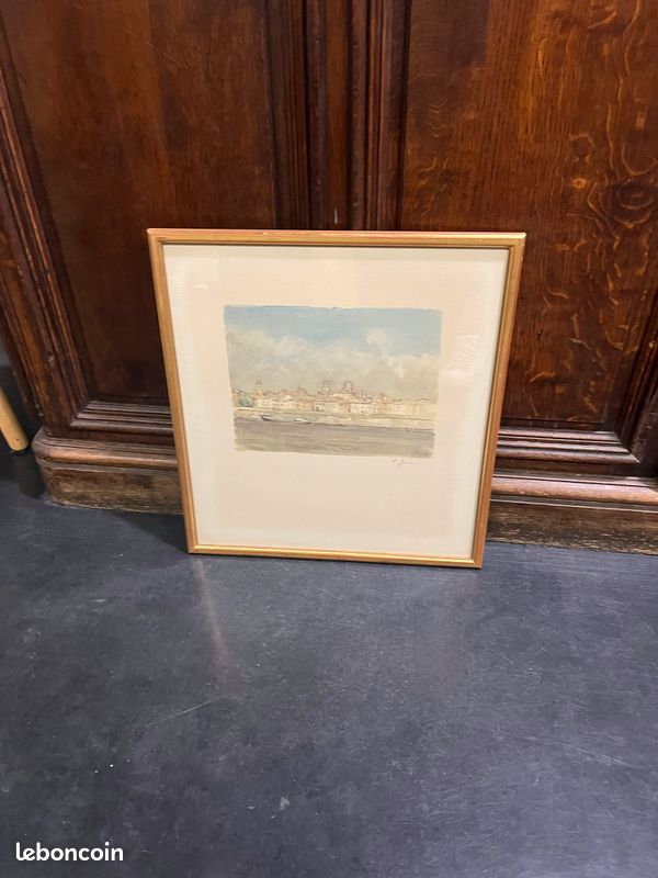 Lithographie signée encadrée. Représentation d’un quai et de sa ville en arrière plan (image 1)