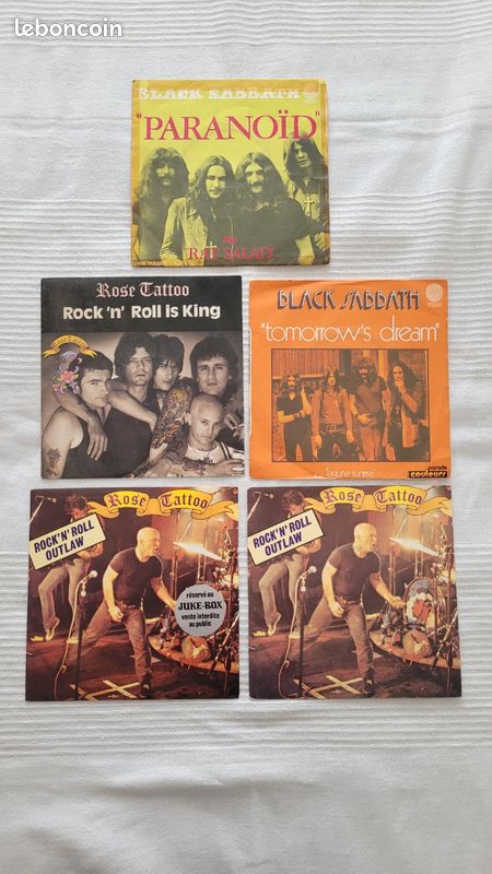 Vinyles 45t- Rose Tattoo + Black sabbath, Nombre : 5 ( 2×45T- Rock'n'roll Outlaw et une version Juke Box année : 1978 + 1×45T- Rock'n'roll is King ( 1981) + 2×45T Black Sabbath : Paranoid ) (image 1)