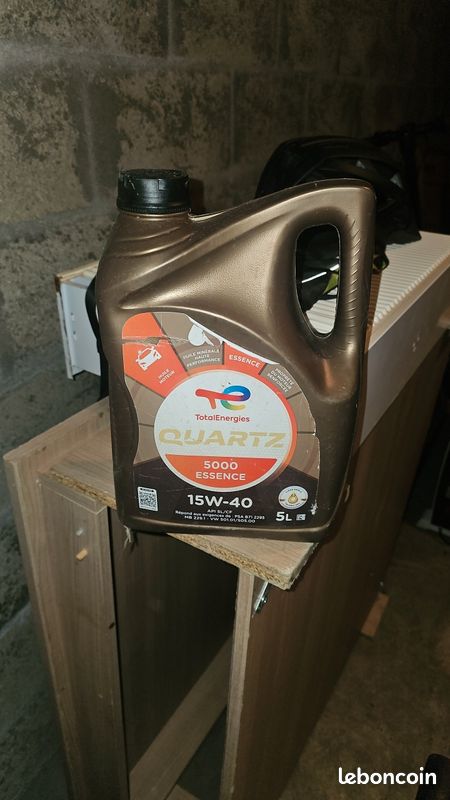 Vend huile moteur essence (image 1)