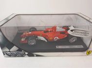F1 FERRARI F2005 Michael SCHUMACHER GP Allemagne 1/18 HOT WHEELS G9727 formule 1