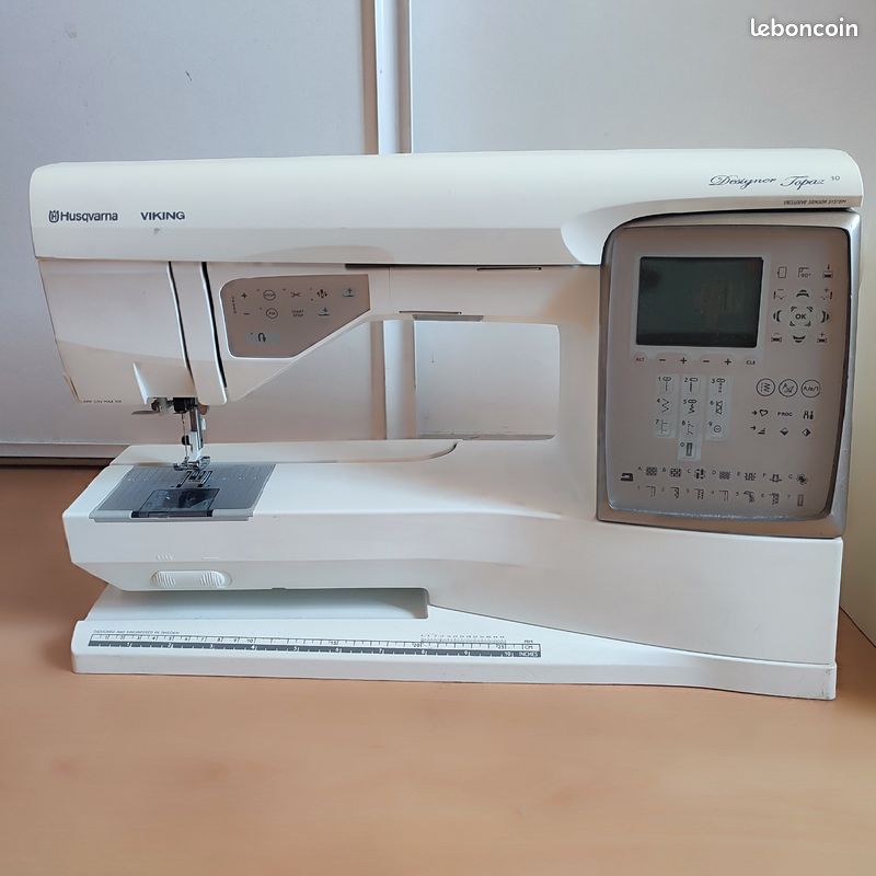 Husqvarna-brodeuse/machine à coudre designer topaz 40
