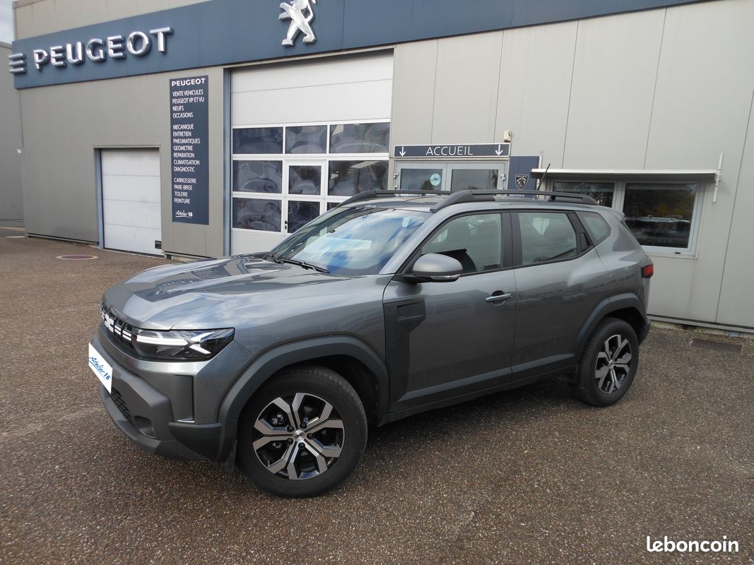 Dacia Duster 130 Ch TCE Mild Hybrid Expression BVM gris + sieges chauffant / NAV et garantie (image 1)