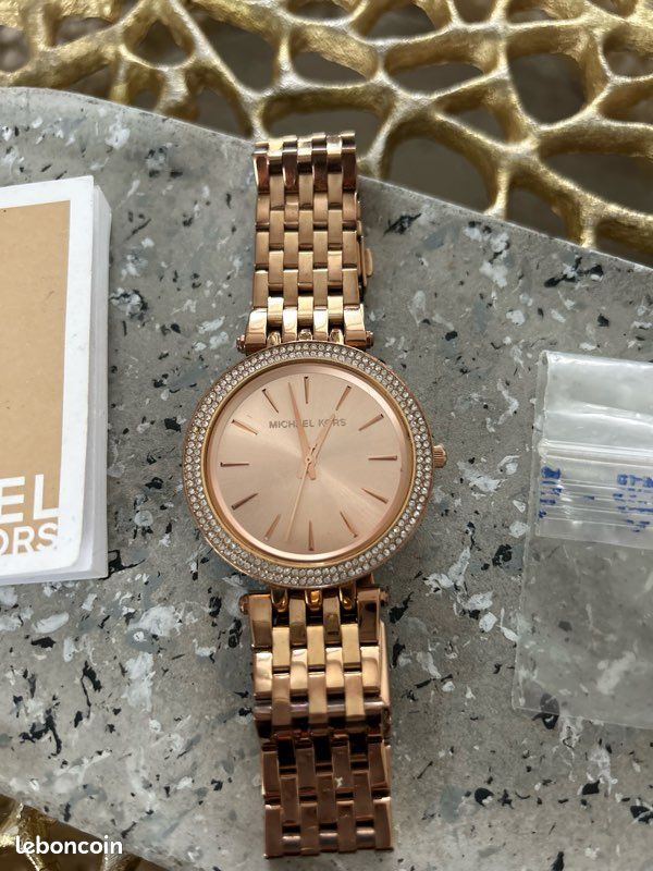 Montre mk (image 1)