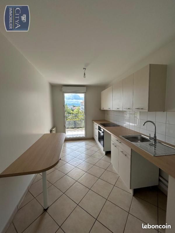 Appartement 4 pièce(s) 91 m²à louer Tassin-la-demi-lune