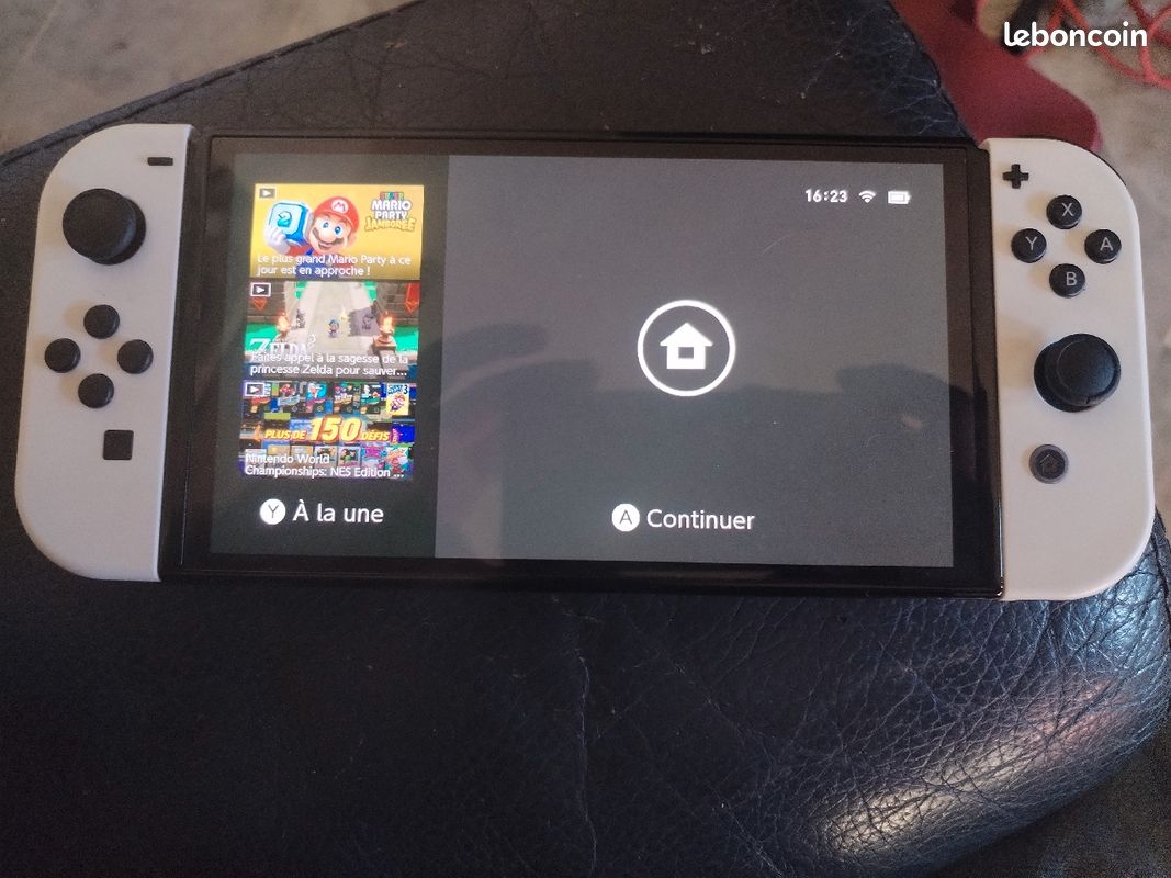 Nintendo Switch OLED comme neuve (image 1)
