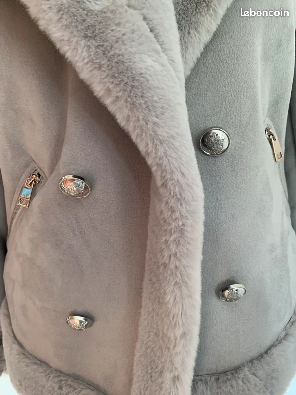 Très jolie veste en fausse fourrure River Island taille 40 Vêtements