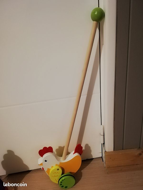 Jouet d'éveil en bois à pousser (image 1)