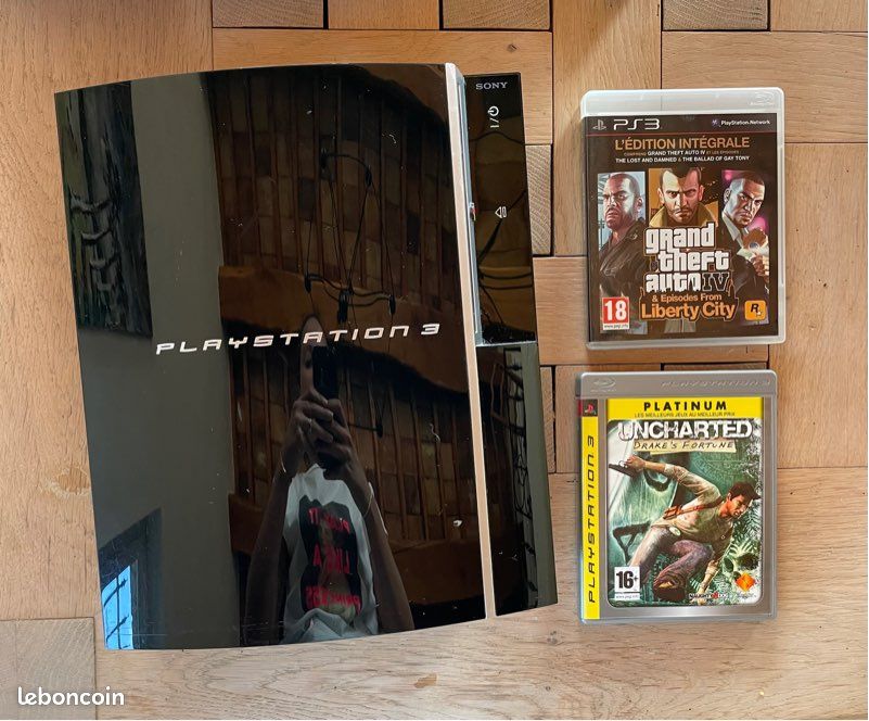 Console PlayStation 3 + 2 jeux (image 1)