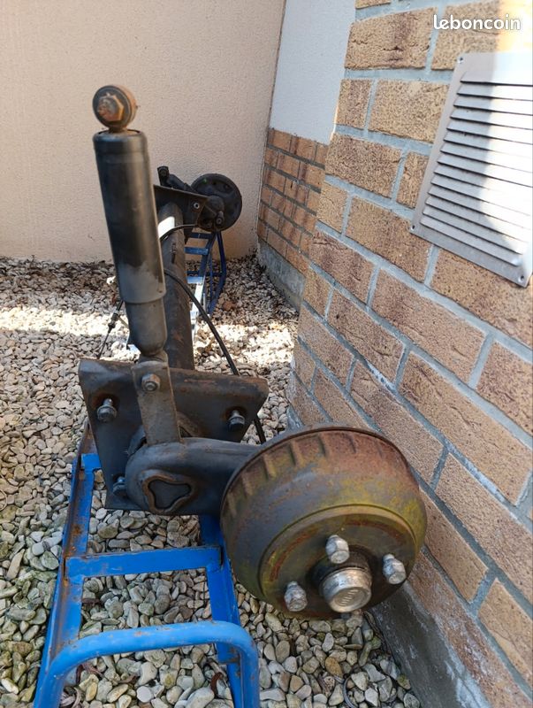 Essieu freiner avec suspension et ses roues (image 1)