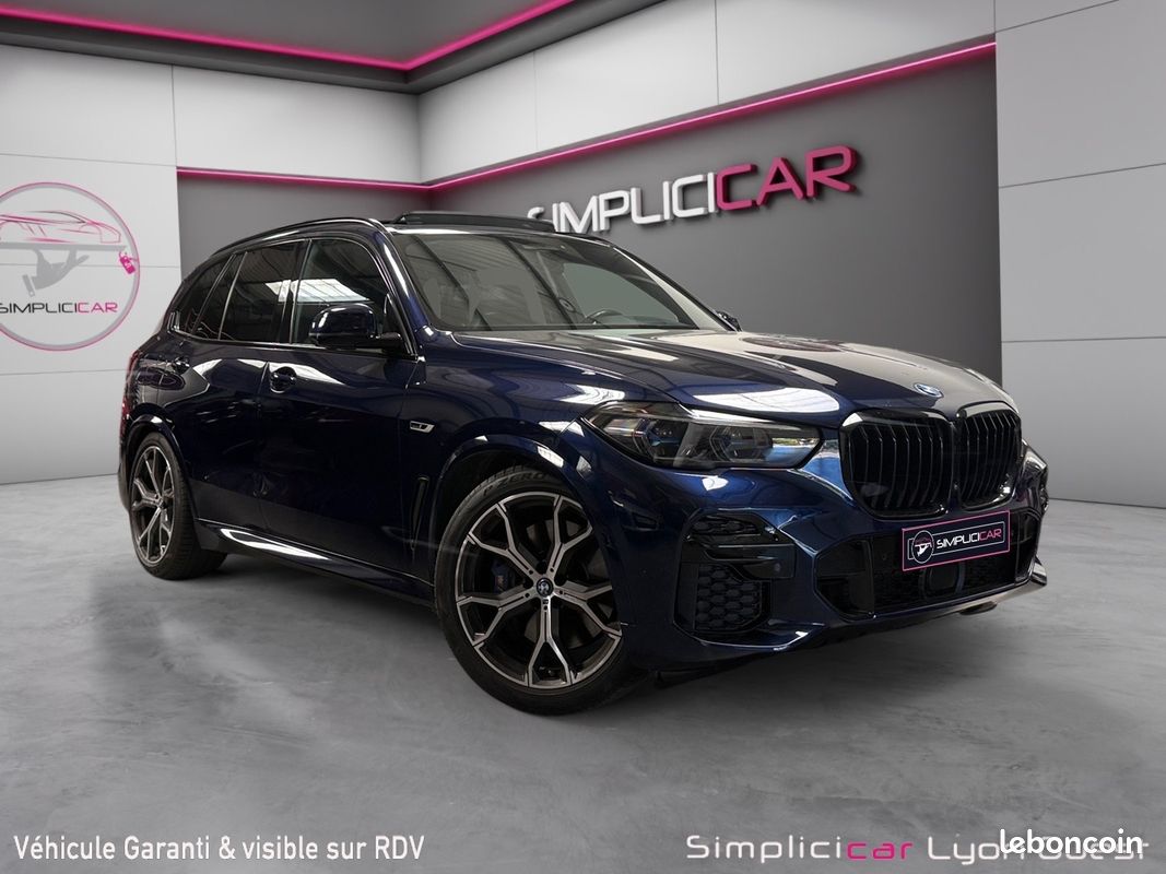 BMW X5 G05 45e xDrive 394 M Sport BVA8 Tanzanite Blue Harman Kardon Sièges M Sky Lounge Garantie 12 mois (image 1)