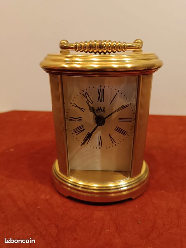 Petite horloge JAZ à quartz (image 1)