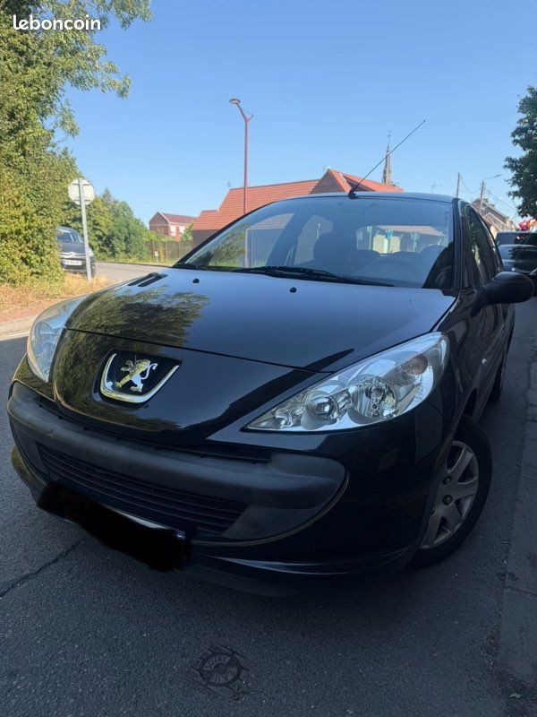 Peugeot 206 1.1 Essence année 2011 (image 1)