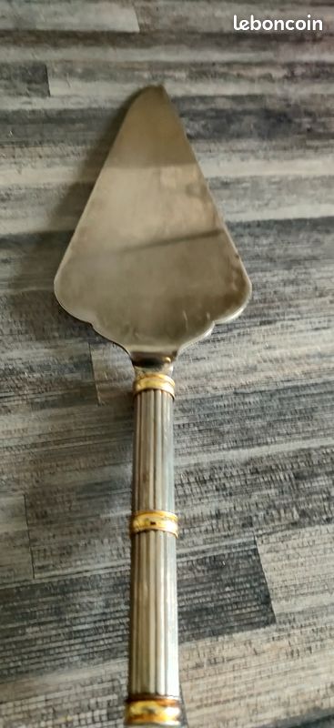 Pelle a tarte métal argenté et dire 6 euros (image 1)