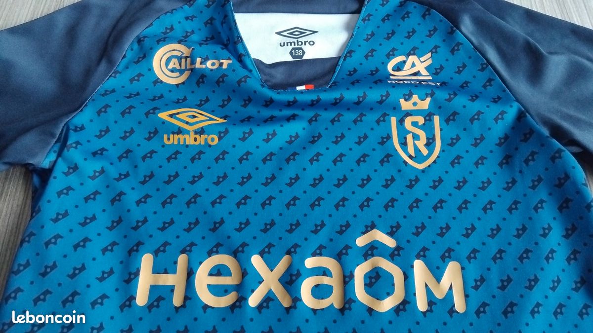 Maillot Stade de Reims 10 ans en très bon état Vêtements