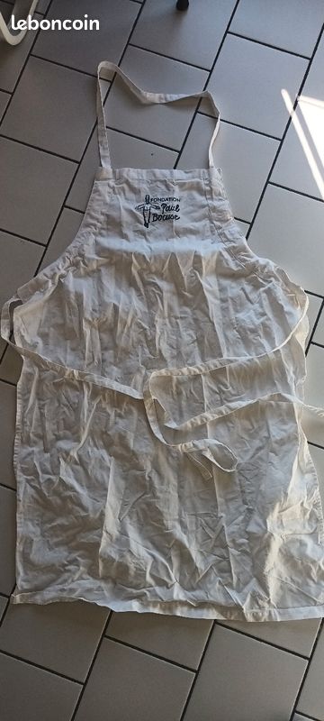 Tablier en coton blanc brodé Fondation Paul Bocuse (image 1)