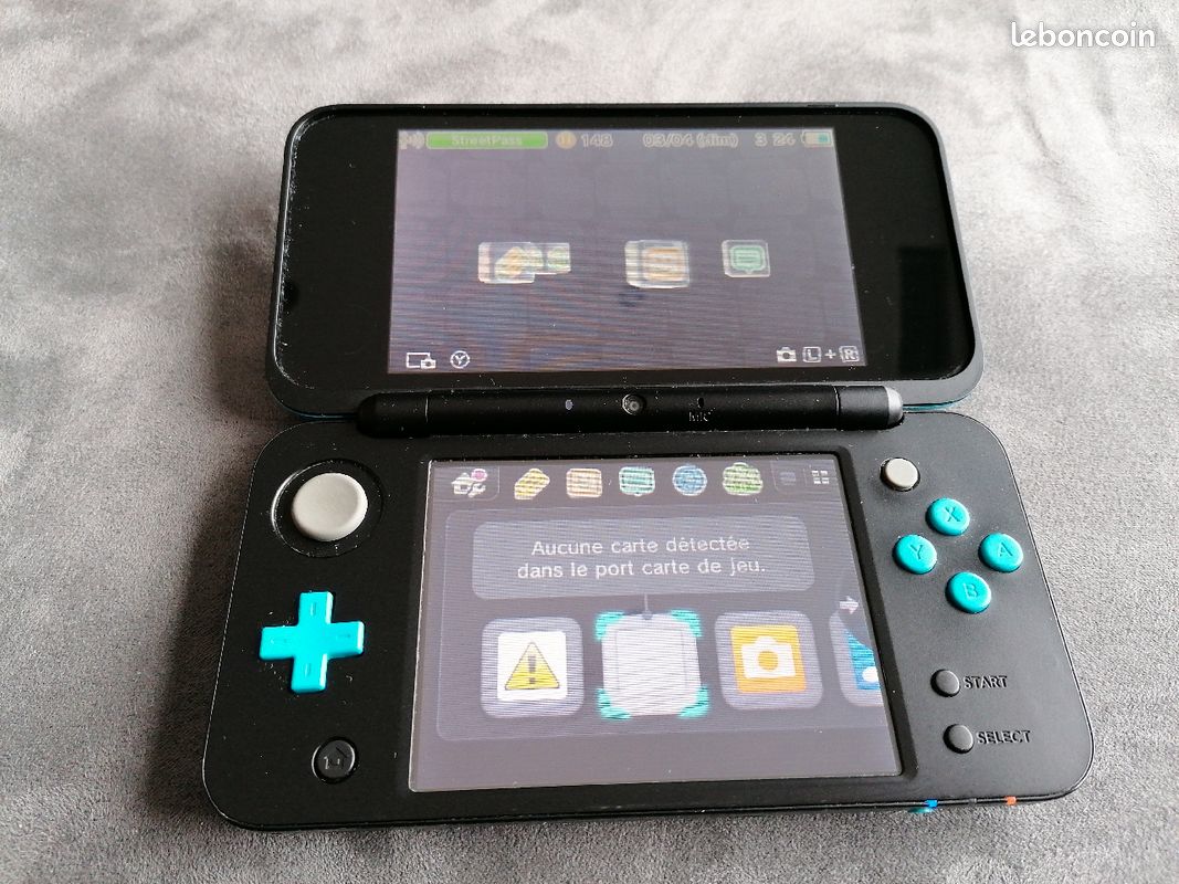 Nintendo 2 ds xl + 18 jeux (image 1)