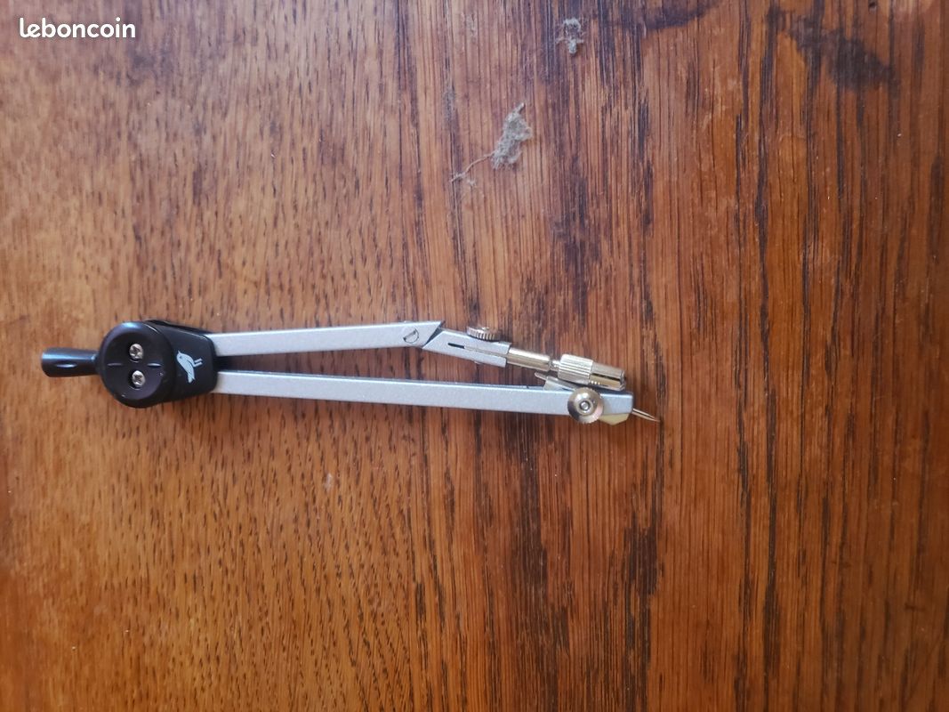 Vend compa neuf (image 1)