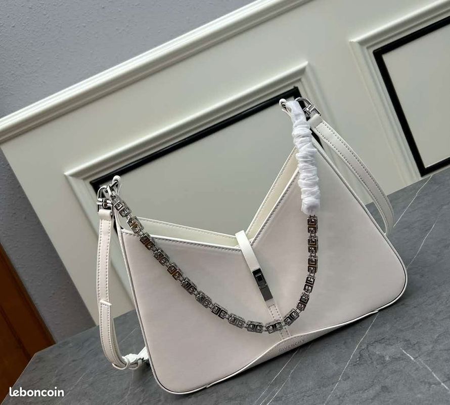 Sac blanc minimaliste et sophistiqué à découpes (image 1)