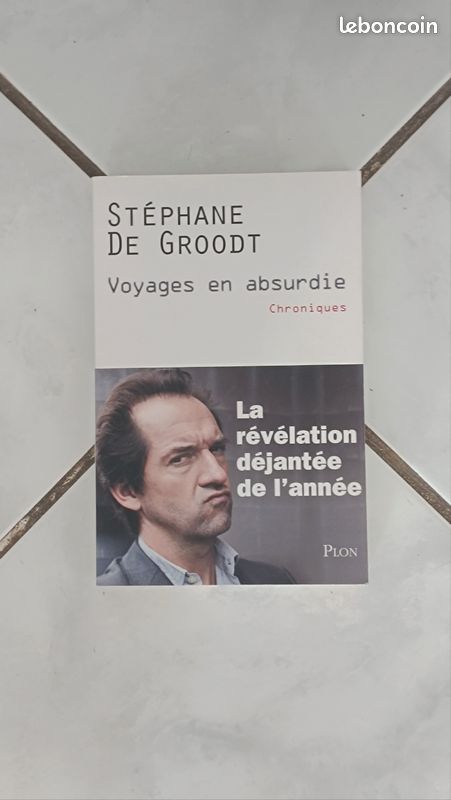 Vends livre STÉPHANE DE GROODT Voyage en absurdie Chroniques La révélation déjantée de l' année en très bon état (image 1)