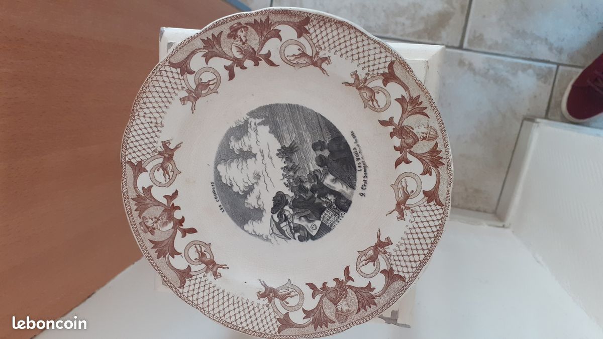 Assiette parlante Les courses en faience de Pexone (image 1)