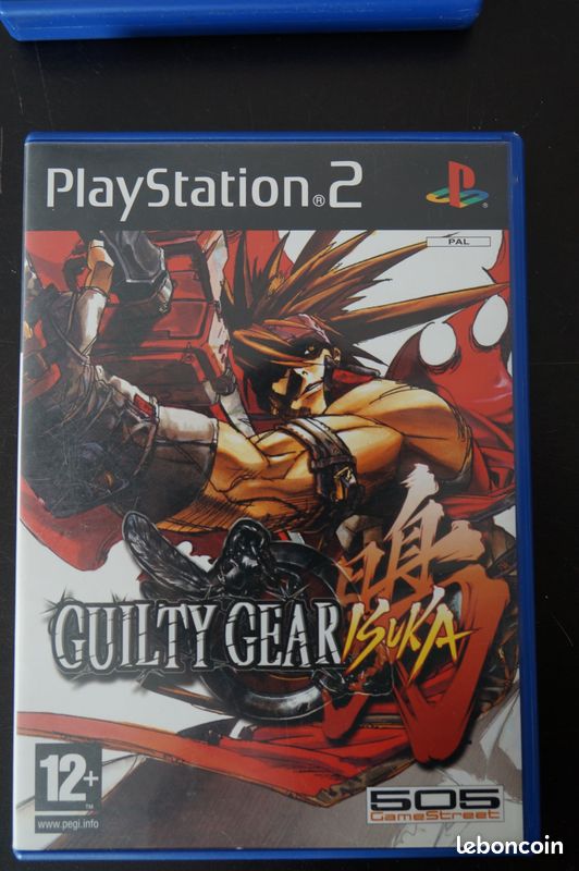 Jeu Guilty Gear Isuka PS2 Version PAL Française - État Correct, Boîtier Abîmé Mais Jeu Fonctionnel