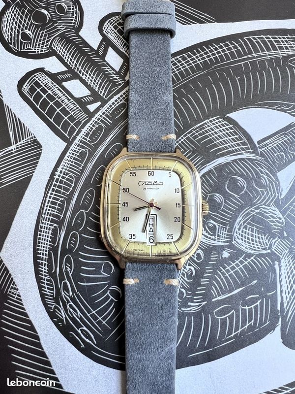 Montre Slava 26 rubis jour et date - URSS - N°380675 (image 1)