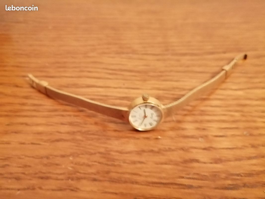 Montre femme plaque or de 1956 (image 1)