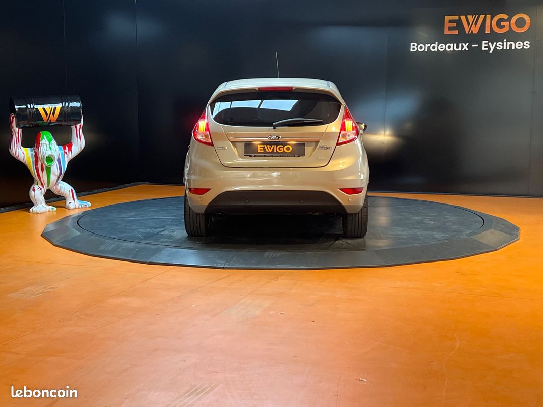 Ford fiesta 1.0 scti 100 titanium - gps - bluetooth - clim auto - suivi entretien - faible kilometrage (image 18)