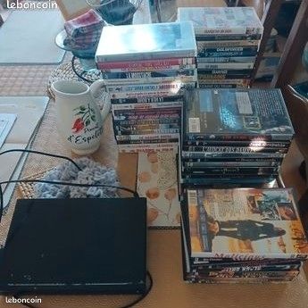 Vends lecteur dvd sans telecommande + lots dvd (image 1)