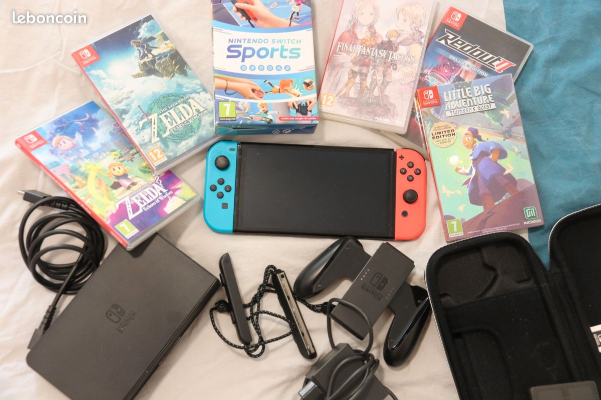 Switch Oled avec 6 jeux (image 1)