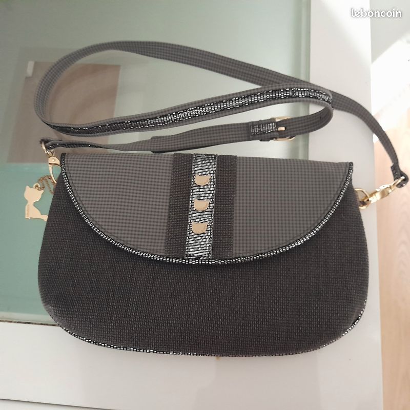Sac bandoulière Lollipops neuf gris avec paillettes
Fermeture avec bouton aimanté (image 1)