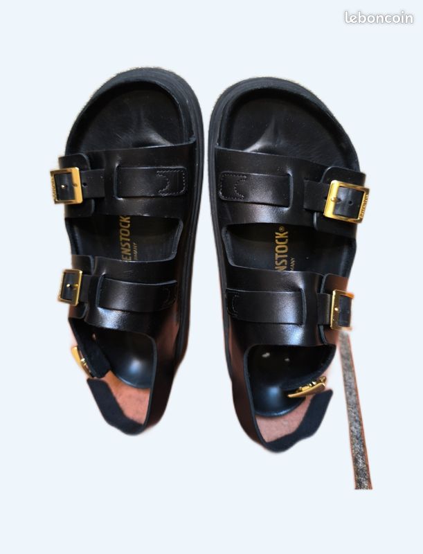 Birkenstock Cannes – cuir noir boucles dorées – taille 39