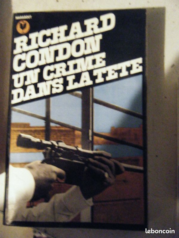 Livre de poche " un crime ds la tete " (image 1)