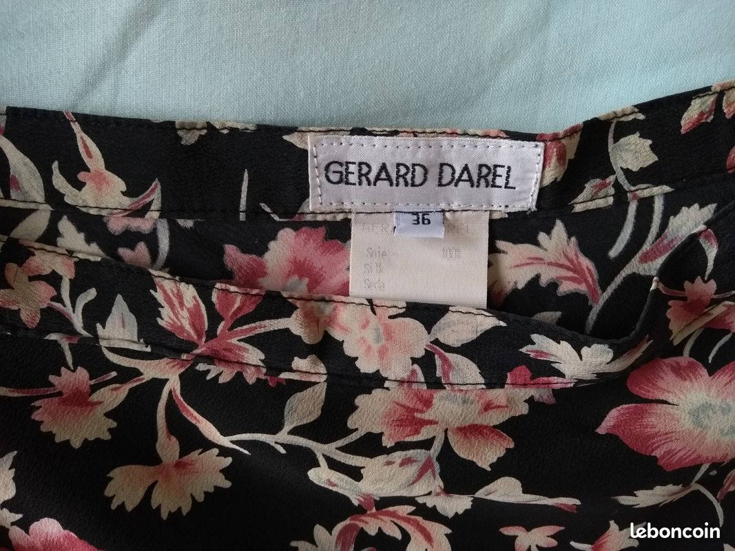 Jupe noire à fleurs évasée et à plis avec poches | Kaufen auf Ricardo