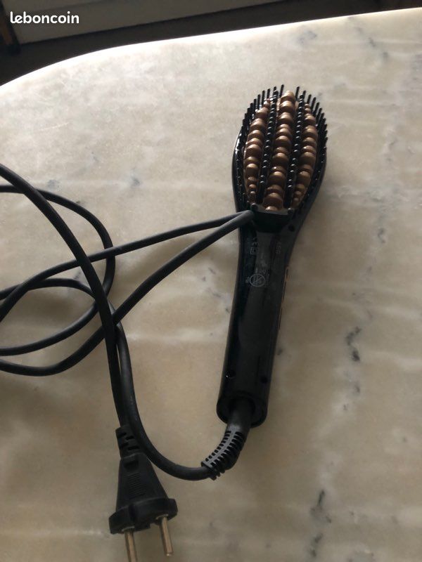Brosse à cheveux éléctrique (image 1)