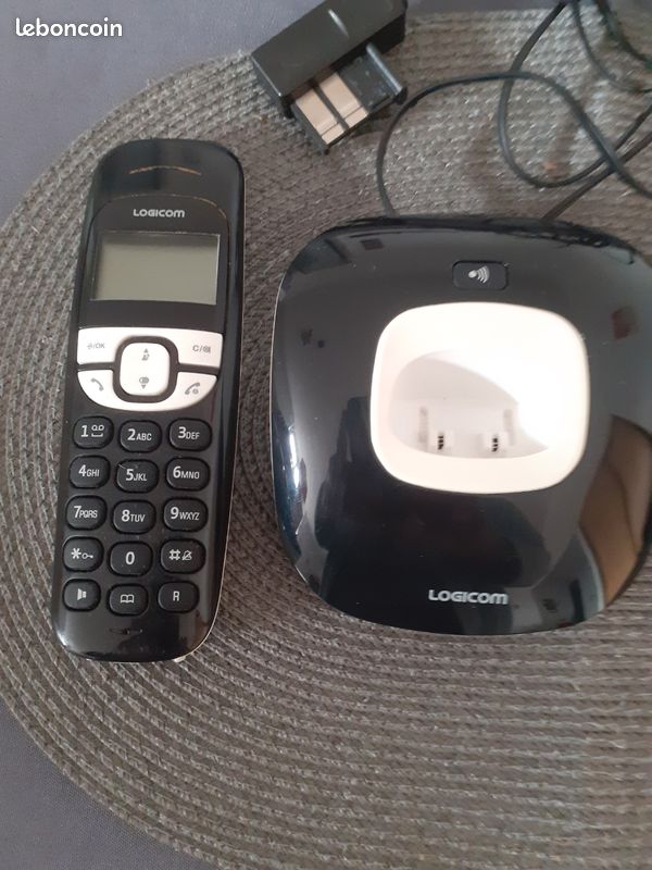 Téléphone de la logicom de couleur noir et blanc (image 1)