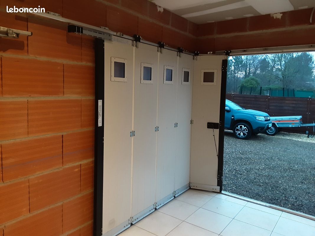 Porte de garage coulissante latérale pvc isolée état neuf Bricolage — free download