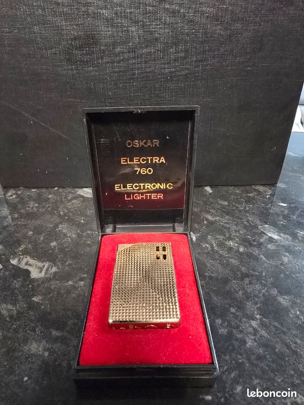briquet cartier a gaz ovale en plaque or dore