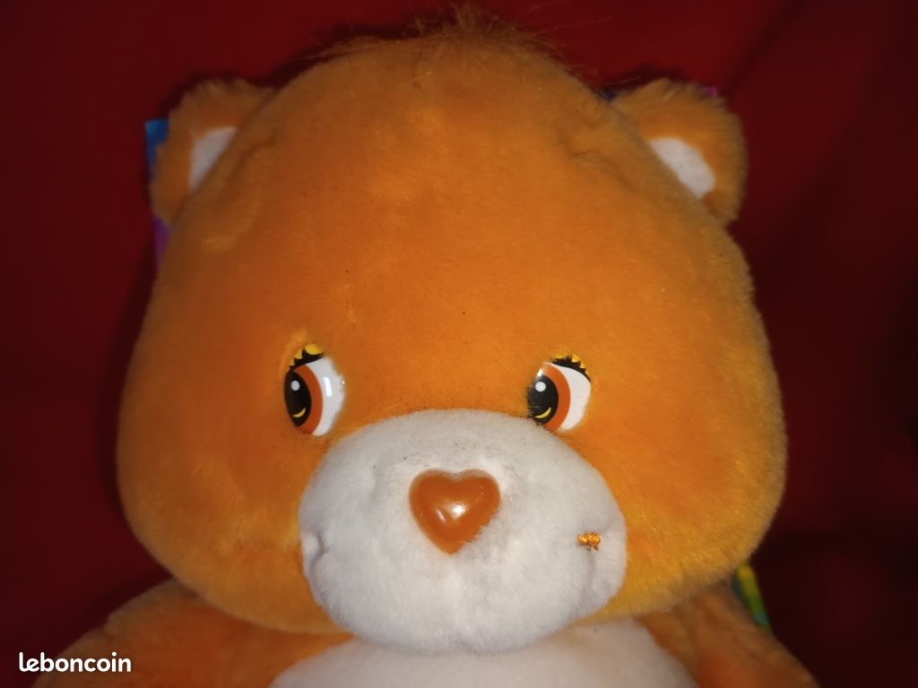 Peluche doudou Bisounours Sucettes 32 cm Care Bears Whitehouse Leasure chez vous des demain