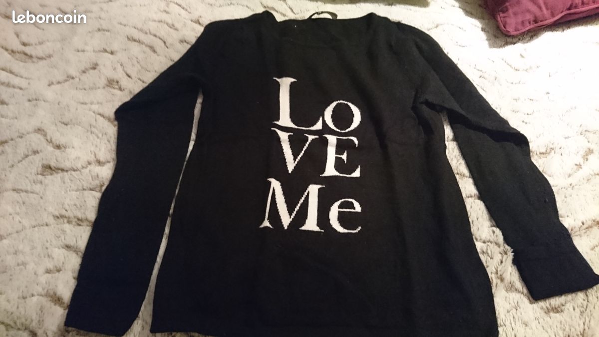 Pull avec écriture taille sx (image 1)