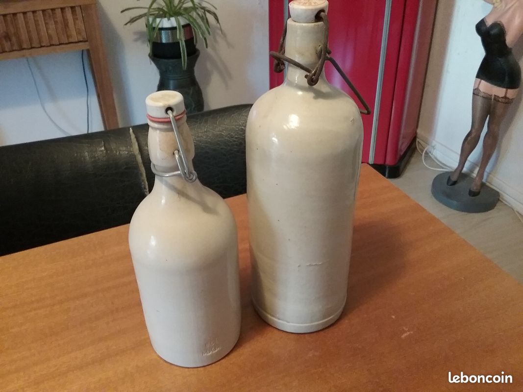 Ancienne bouteille a biere grès émaillée (image 1)