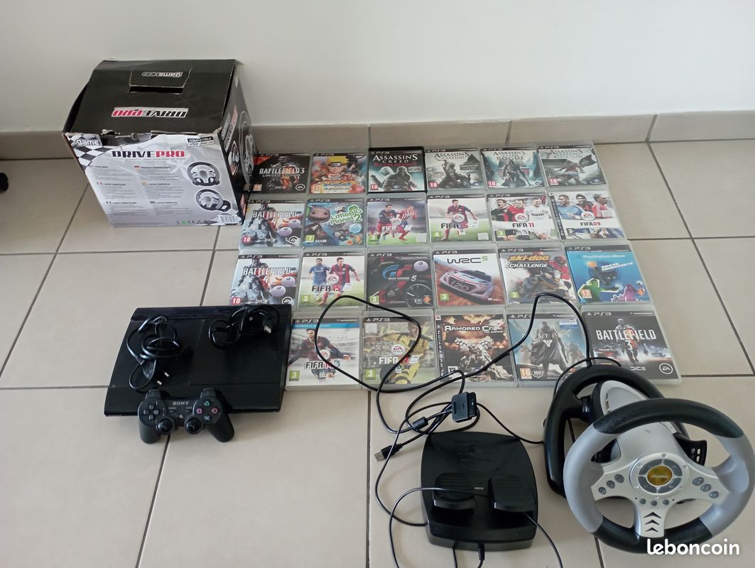 Vends ps3 Ultra Slim 500Go + volant + 23 jeux (image 1)