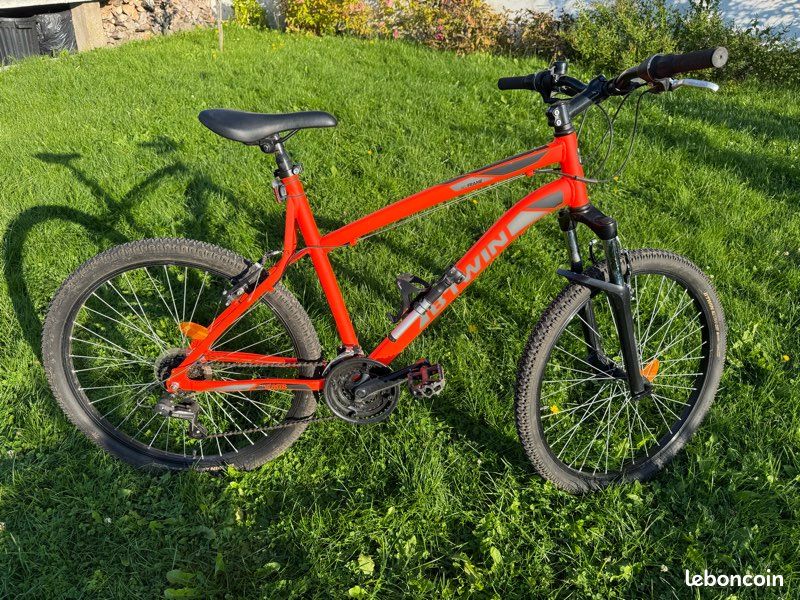Vélo VTT B'Twin Rockrider 340 orange fluo Taille L Roues 26 - Main Image