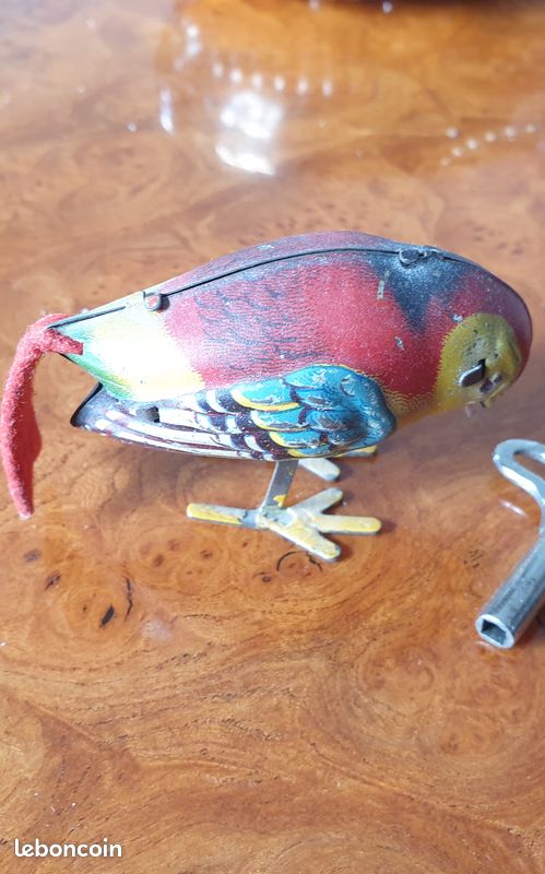 Ancien oiseau mécanique en tôle (image 3)