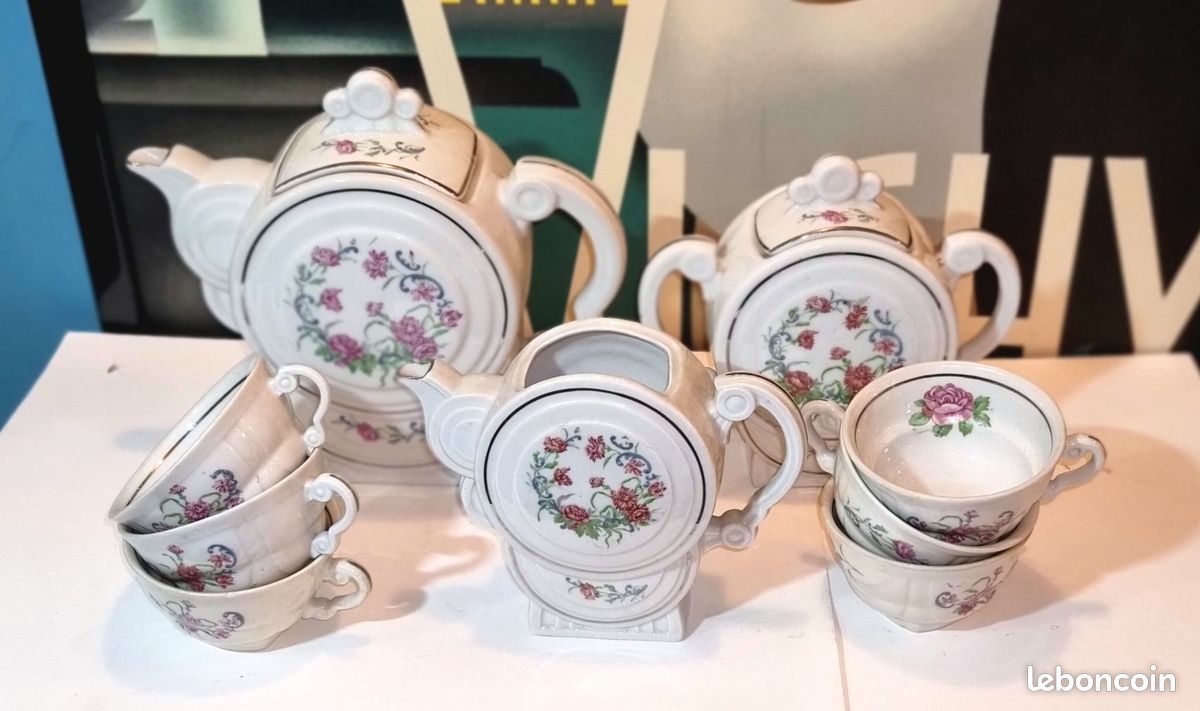 HENRIOT, Quimper - Service à huîtres en faïence polychrome composé de