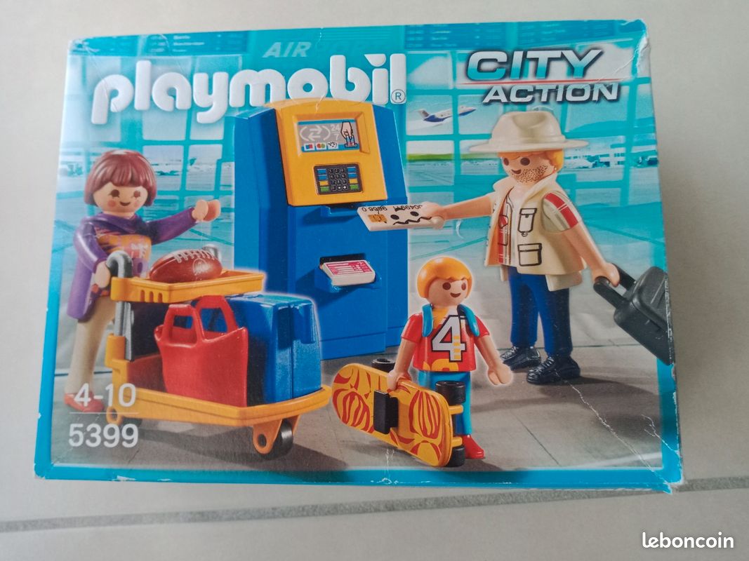 Playmobil Famille de vacanciers et borne d'enregistrement (image 1)