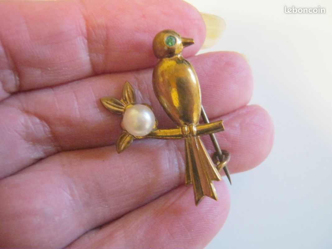 Broche oiseau avec des plumes véritables