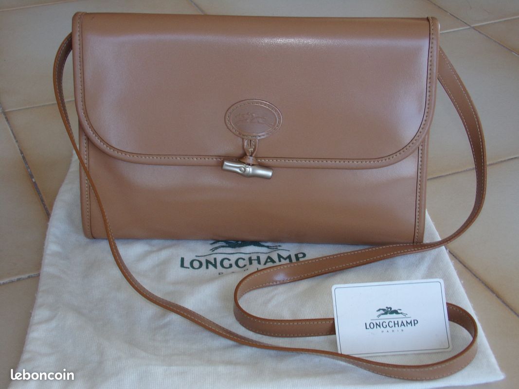 Pochette Longchamp beige. Très peu utilisée (image 1)