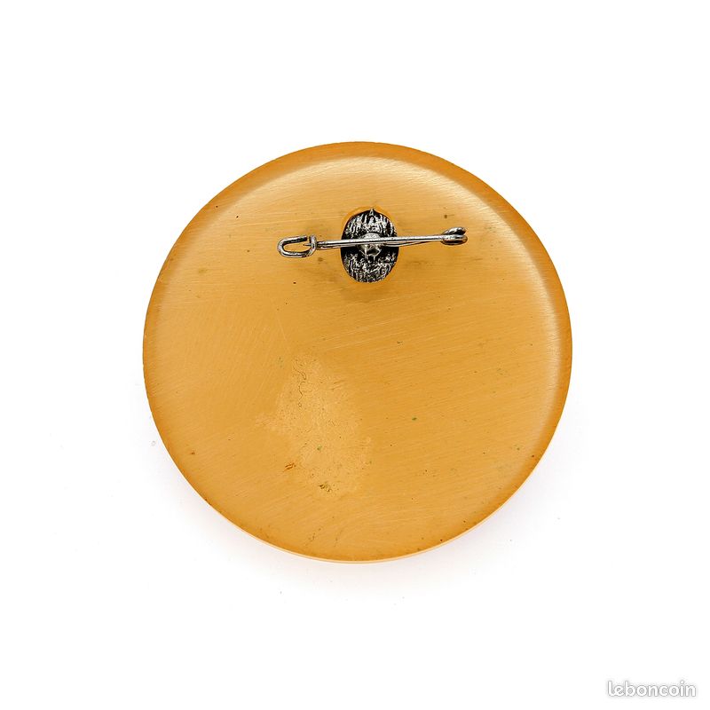 Jean PANLEVE broche dragón art deco galalthe baquelta y metal doré